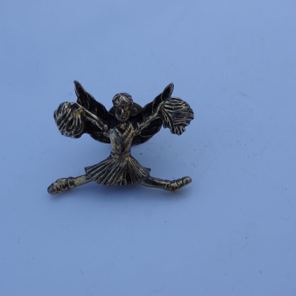 Women`s gold tone cheerleader brooch pin. 1 3/8 in